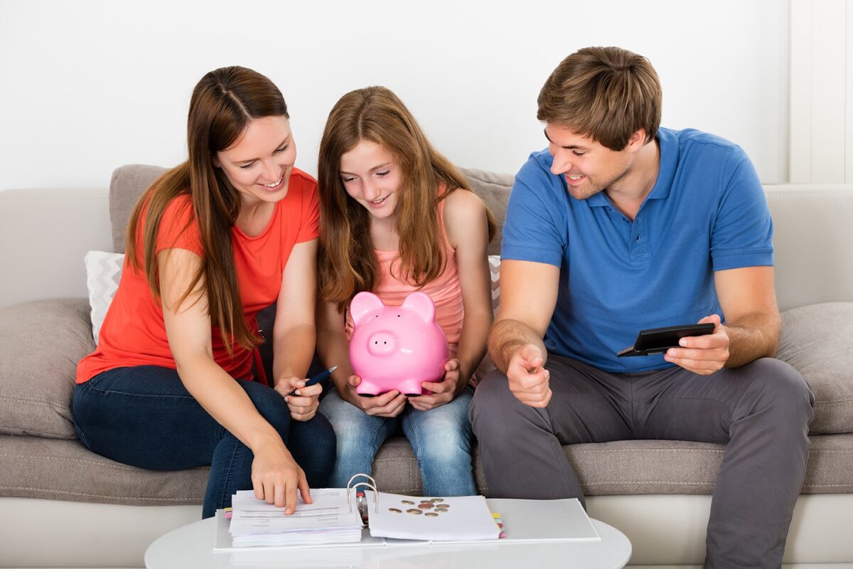 Teen saving money with help of parents