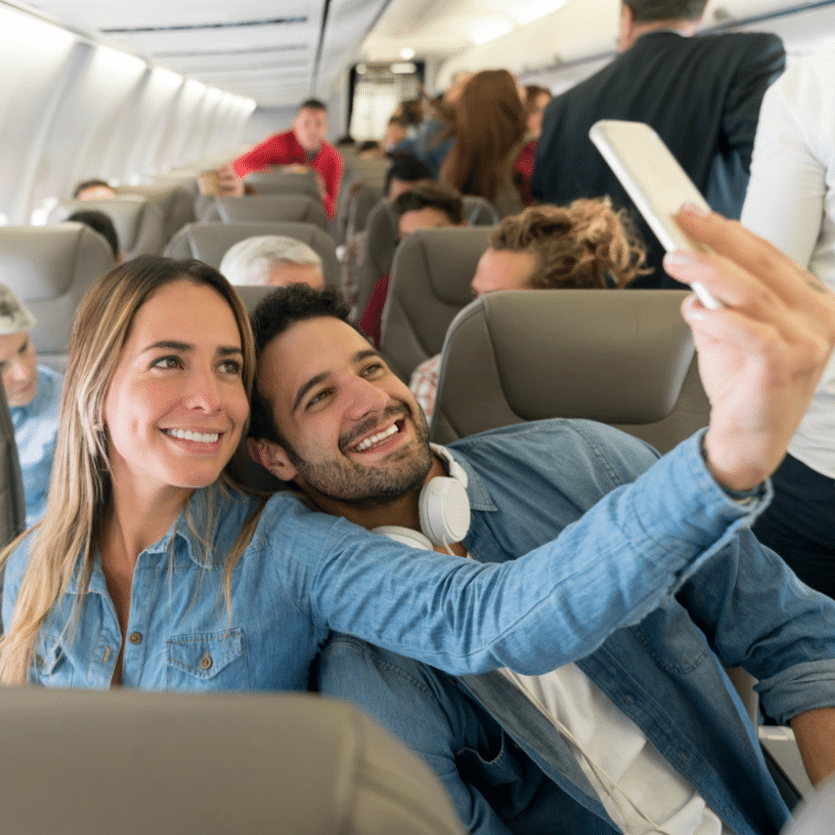 family on trip in airplane